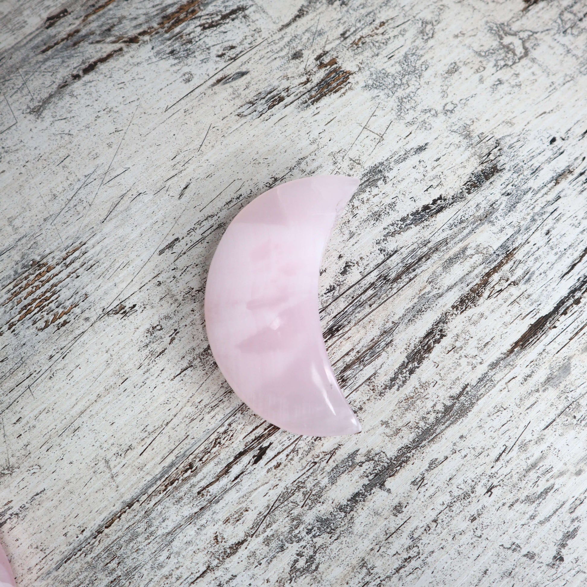 Moon Carving Crystal for feminine, heart-healing energy.