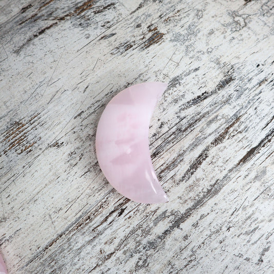Moon Carving Crystal for feminine, heart-healing energy.